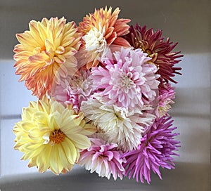 Close up Flower arrangement of an Assortment of Dahlias with an overhead view