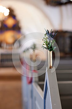 A close up of a flower Cross on Church Alter