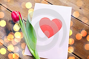 Close up of flowers and greeting card with heart