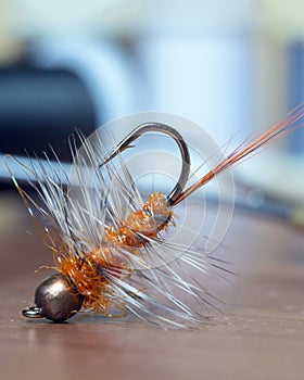 Close up of a fly fishing fly. Hand made fly for fishing