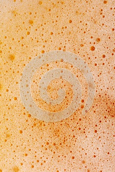 Close-up of foam in beer as abstract background