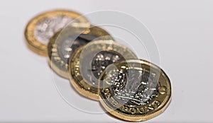 Close up focus photos of new United kingdom Pound coin isolated on a white background