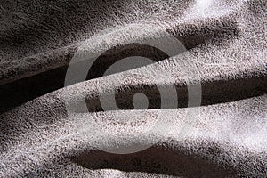 Close-up of a fold of fabric with an abstract pattern