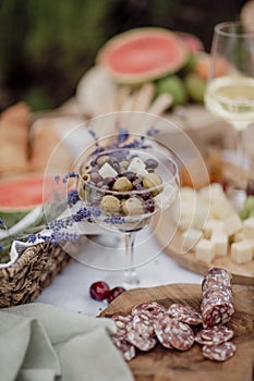 Close-up of food on the open diaphragm of food Summer season.Lavender fields. Picnic in the Countryside.