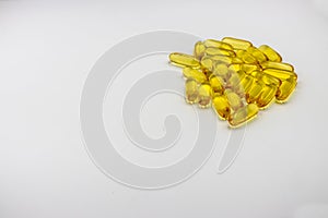 Close up of food supplement oil filled capsules suitable for: fish oil, omega 3, omega 6, omega 9