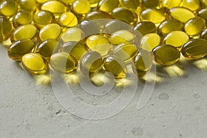 Close up food supplement oil filled capsules suitable vitamin A, vitamin D3, fish oil, omega 3, 6, 9, evening primrose, borage oil