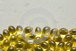 Close up food supplement oil filled capsules suitable vitamin A, vitamin D3, fish oil, omega 3, 6, 9, evening primrose, borage oil