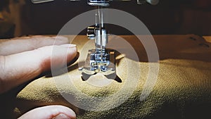 Close up of foot of sewing machine