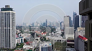 Close up footage of sky scrapers at sunset in Jakarta