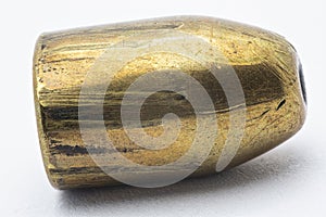 Close up, Forensics ballistics rifling marks on bullet also known as land impressions and groove impressions photo