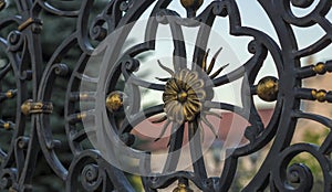 Close-up of forged element, vintage fence