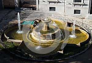 Close-up of the fountain in the Plaza Adolfo Suarez. High angle view. photo