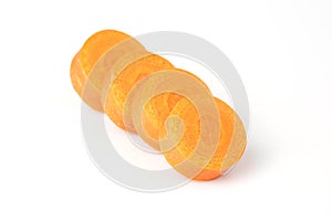 Close up four round thin cut Carrot slices isolated on white