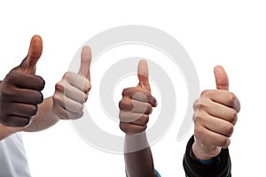 Close Up Of Four Thumbs Up