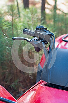 Close Up of a Four Wheel ATV in the Forest