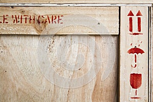 close-up of fragile symbol on woodboard