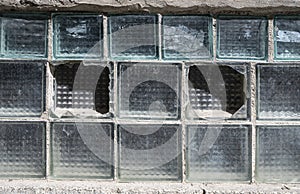 Ragment of an old wall made of cracked  glass blocks photo