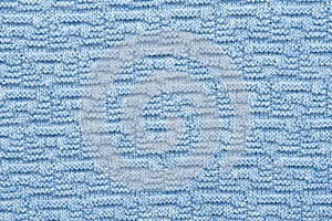 Close-up fragment of warm knitted blue sweatshirts. Concept of warm everyday things. clothing store concept. Advertising
