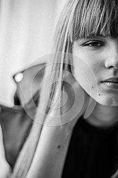 Close-up fragmentary  portrait of a beautiful thoughtful  teenage girl