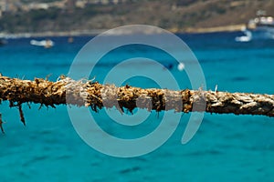 Close up of frayed rope at the Blue Lagoon, Comino, Malta