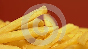 Close up of french fries, unhealthy fatty food with big amount of calories