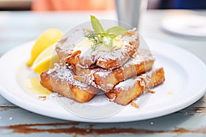 close-up of french toast dusted with powdered sugar