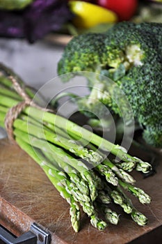 Close up Fresh Asparagus on Wooden Board