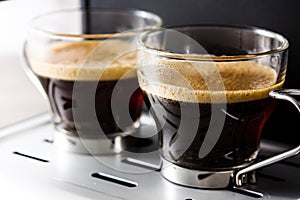 Close up fresh coffee in espresso machine