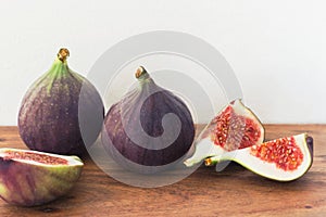 Close up of fresh fig fruit on wooden table