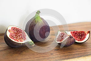 Close up of fresh fig fruit on wooden table