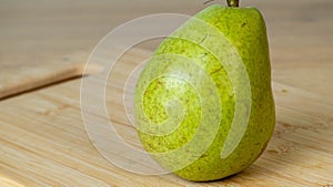 Close-up of a fresh green pear