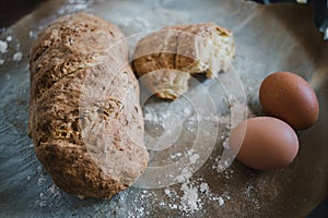 Fresh homemade bread on baking paper