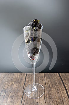 Close-up of fresh mulberries in glass on table, photographed in Shanghai, China