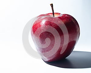 Close up of an organic apple fruit with outdour Background photo