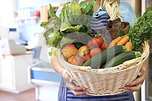 Close Up Of Fresh Produce In Basket At Farm Shop