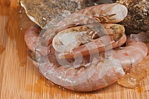 Close up of Fresh, raw oyster and pink shrimp