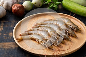 Close up Fresh raw shrimp Litopenaeus vannamei on wooden plate