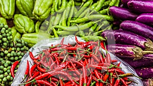 Close up of fresh and red chilli on an asian street market