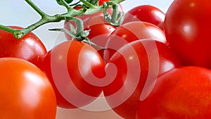 close up fresh red color cherry tomatoes in white background, vegetable, vegan food, raw food, wallpaper, organic business concept