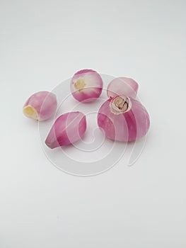 Close up Fresh red onion agains white background