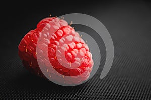 Close up, fresh and ripe red raspberries. Pink raspberry macro shot