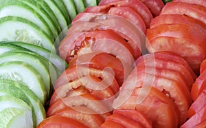 Close Up Fresh Slice Tomatoes and Cucumbers