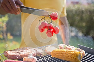 Close-up of fresh tomatoes and BBQ
