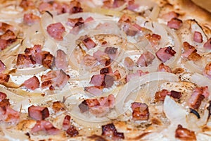 Close-up on fresh traditional flammkuchen