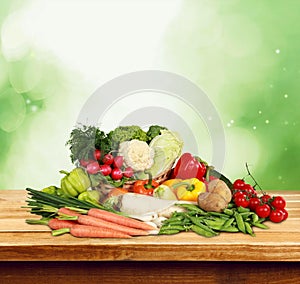 Close-up of fresh vegetables on wooden table