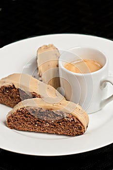 Close up of freshly baked coffee chocolate biscotti with carmel glaze