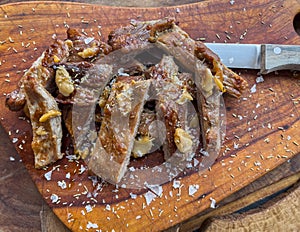 Close up of freshly cooked pork Secreto de ventresca pure iberico with garlic photo