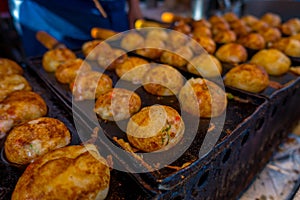 Close up of fried food located in a public market at Dotonbori district at Osaka Japan