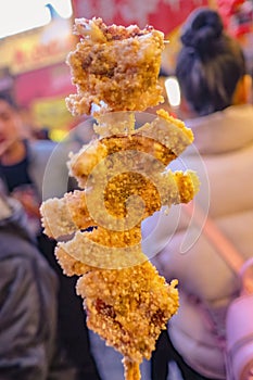 Close up Fried Giant octopus in Wangfujing Walking street and street food in beijing city