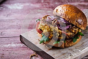 Close up on a fried mealworm insect burger